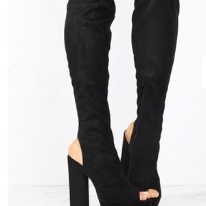 Knee high black heels NWOT